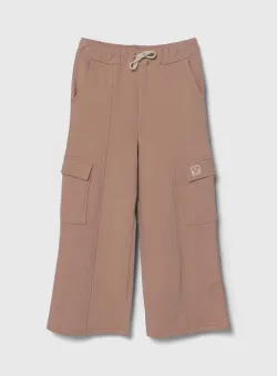 United Colors of Benetton pantaloni de trening din bumbac pentru copii culoarea bej, neted