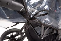 Husa de ploaie cu fereastra pentru carucior copii Caretero,din material rezistent,compatibila carucior sport